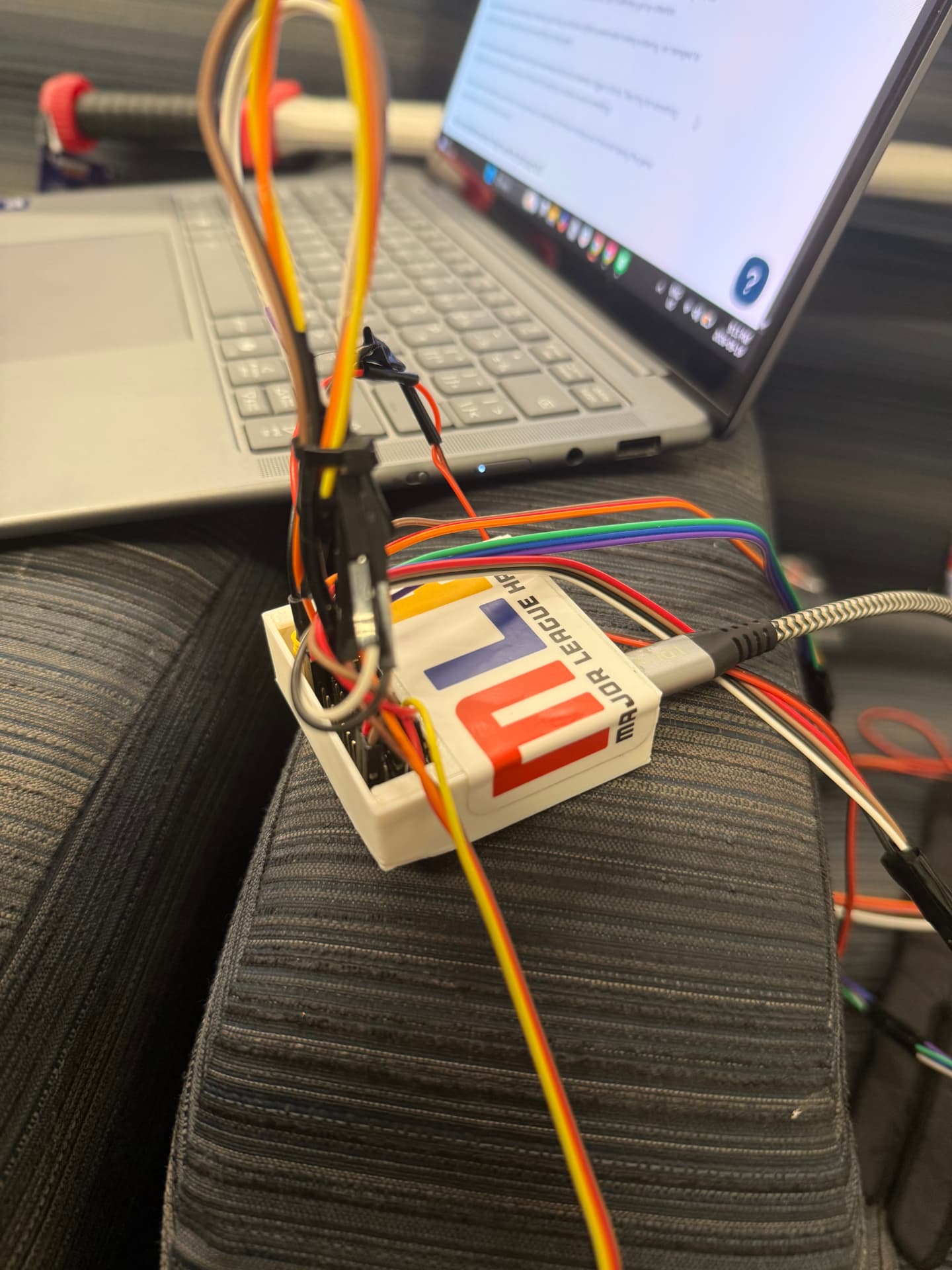 Close-up of Gestura's wired controller board during the Hack the North build